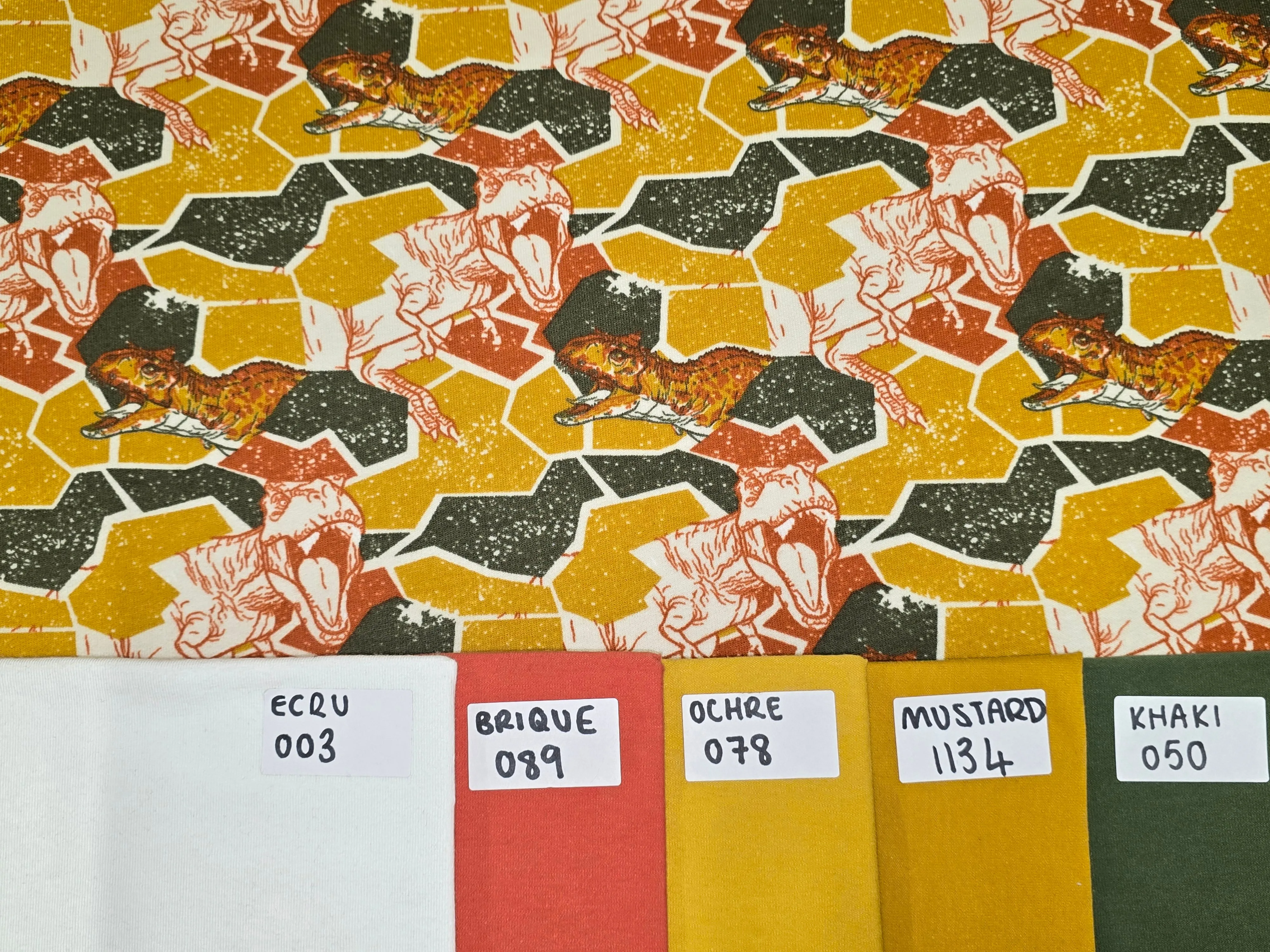 1.35M REMNANT MUSTARD DINO BRUSHED FRENCH TERRY SALE