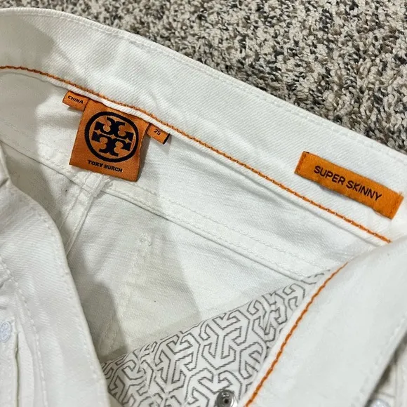Brand new, never worn, Tory Burch White Bootcut Jeans- Size 25 Inseam 34.