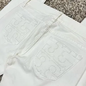 Brand new, never worn, Tory Burch White Bootcut Jeans- Size 25 Inseam 34.
