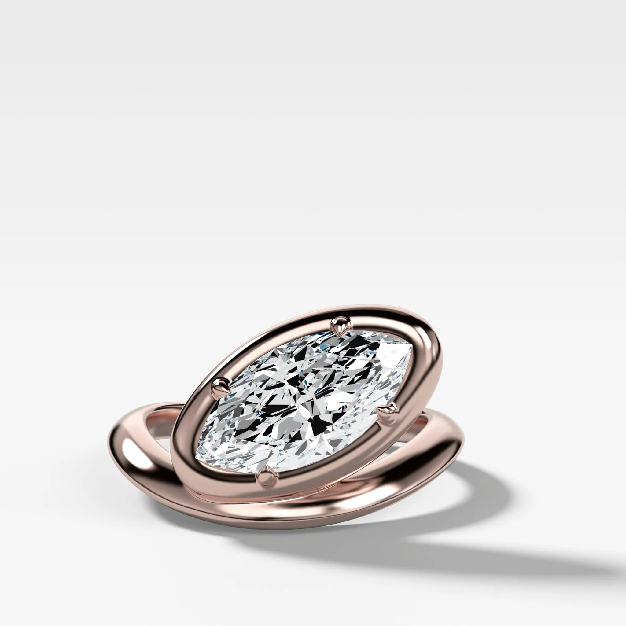Contoured Club Engagement Ring with a Marquise Cut Diamond