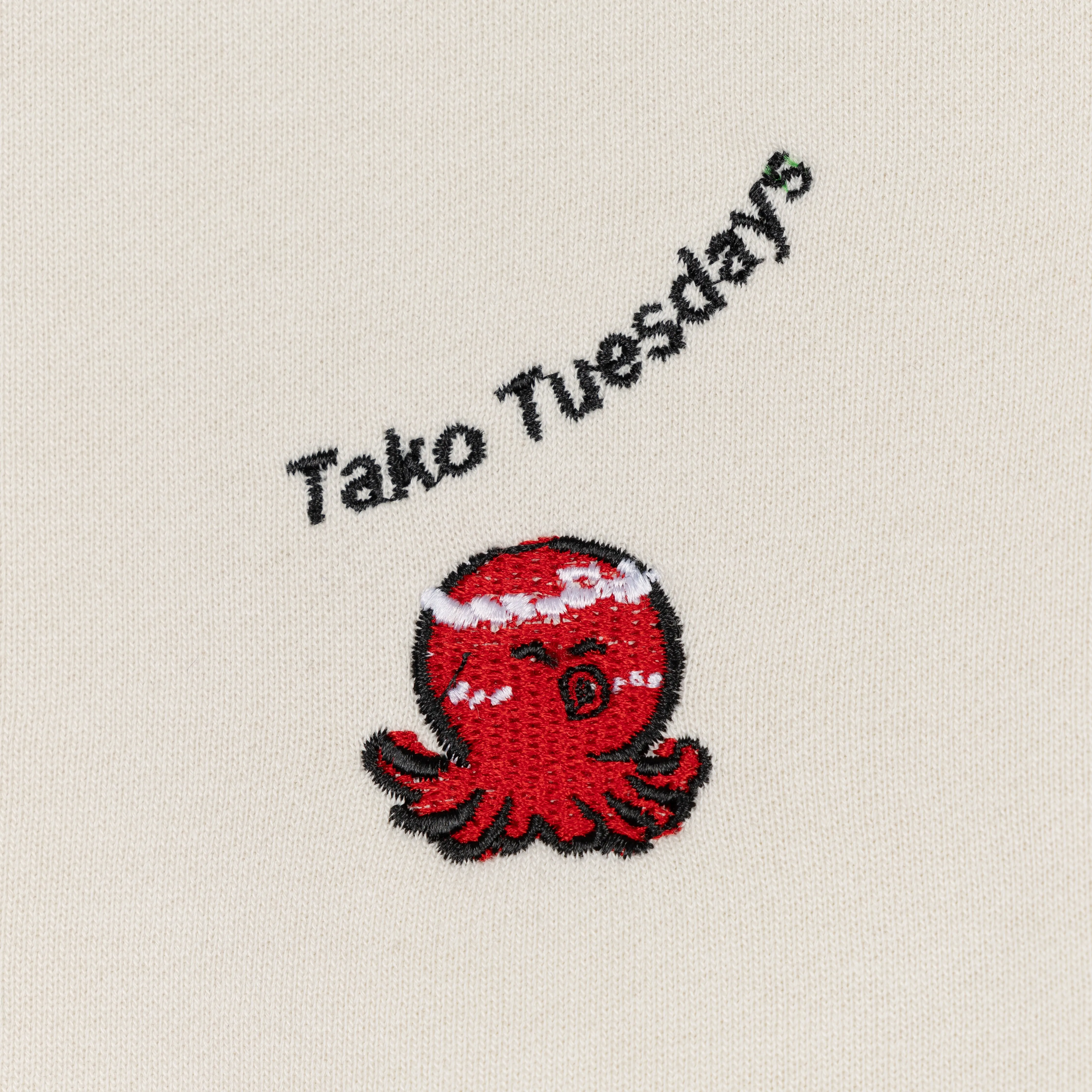 Crewneck Pullover Sweatshirt with Embroidered Icon - White Onyx / Tako Tuesdays