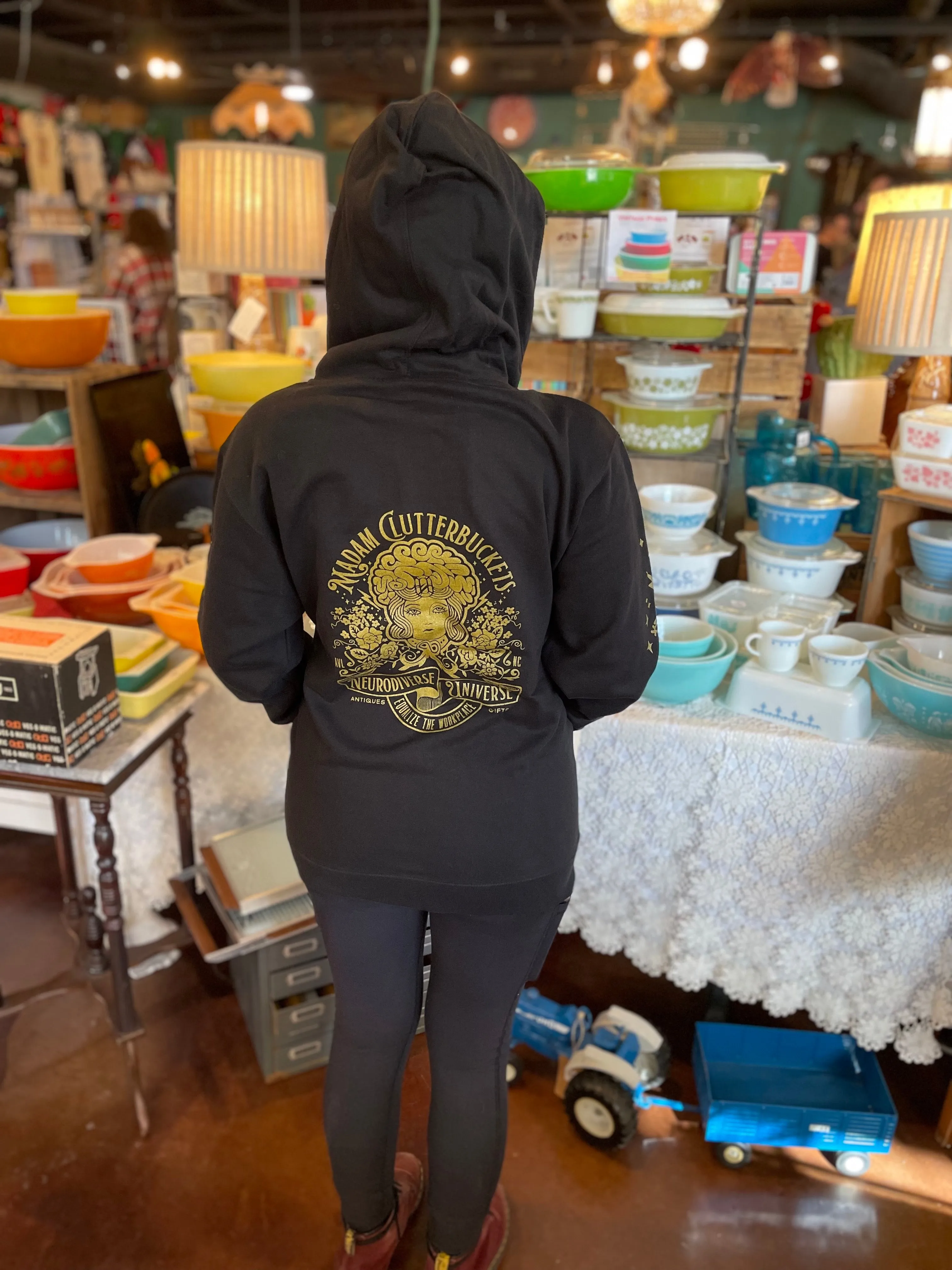 Madam Clutterbucket's Neurodiverse Universe Logo Hoodies!