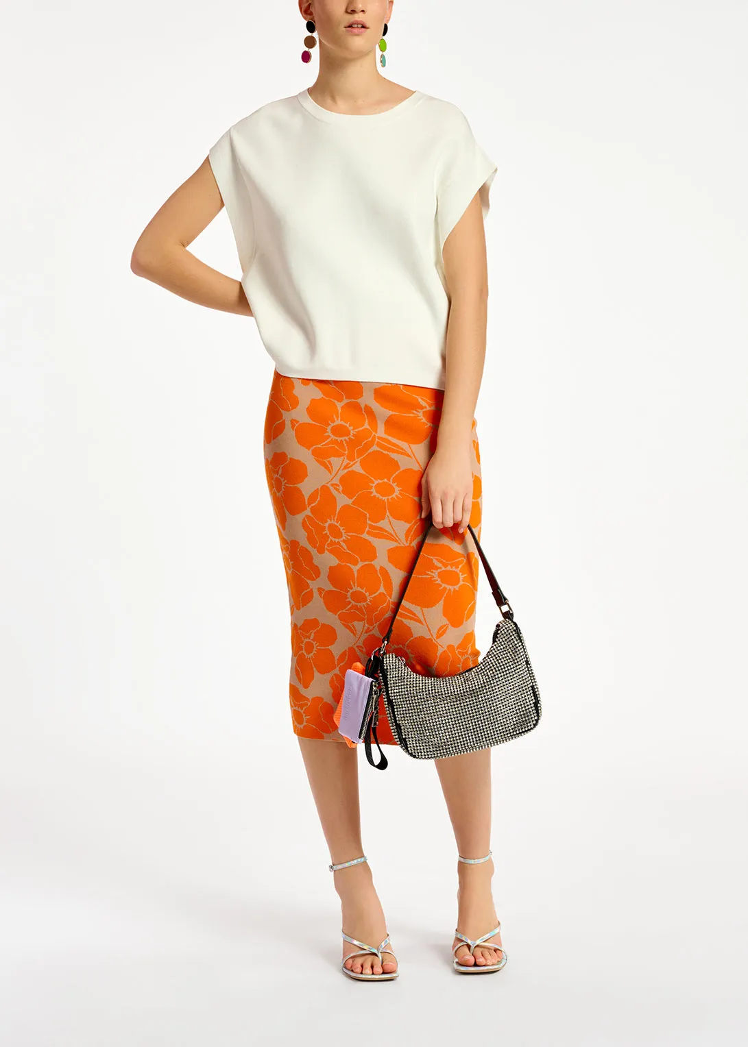Off-white sleeveless knitted sweater